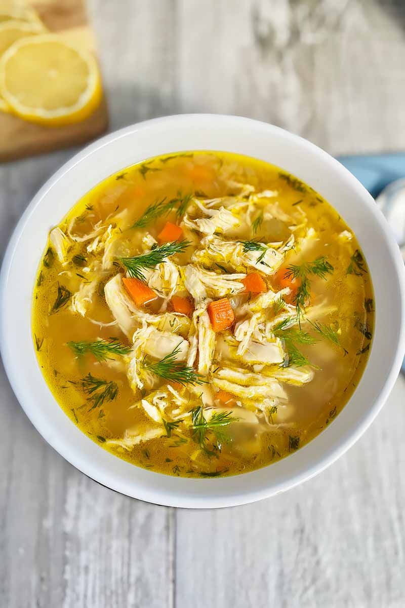 Bowl Of Yellow Soup With Dill